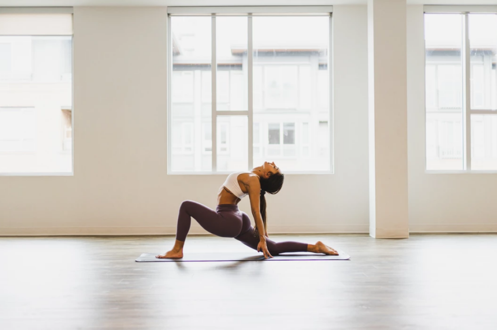 Woman doing yoga at VNYSA Yoga Studio