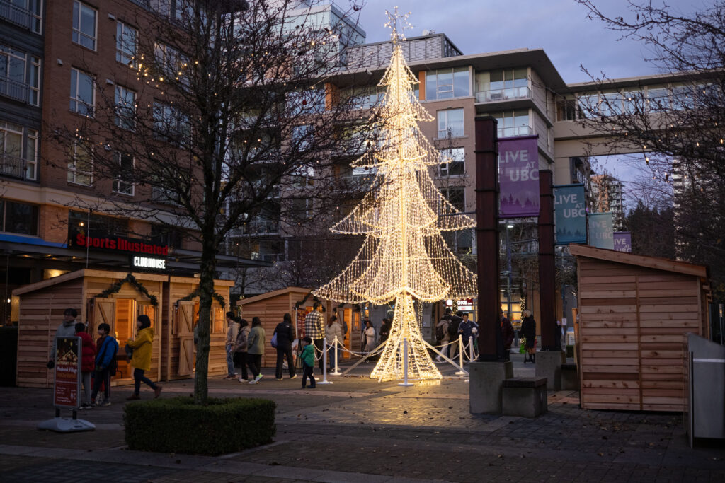 People shopping at the Wesbrook Village Holiday Market